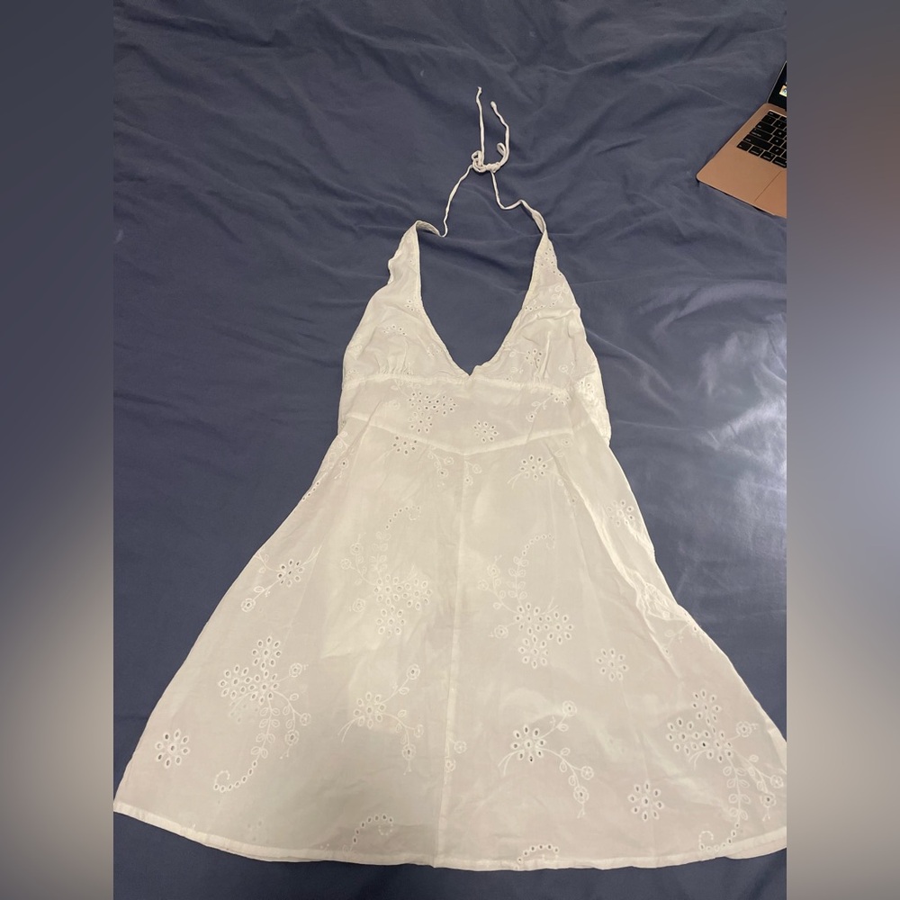 white halter dress with beautiful designs